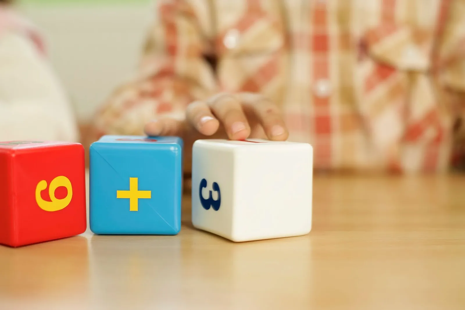 Printed primary mathematics worksheets with number lines, arrays and generous working space